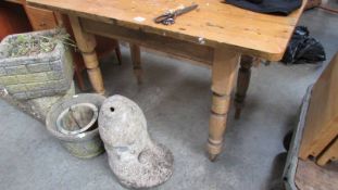 An early 20th century pine table.