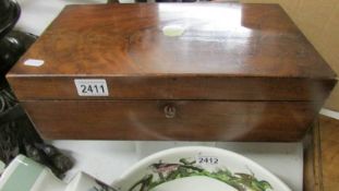 A mahogany writing box.