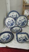 Eight pieces of Booth's 'Old Willow Pattern' dinner ware.