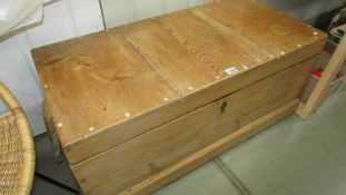 A Victorian pine blanket box with rope handles, 106 x 51 x 48 cm.