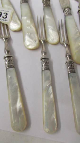 A set of fish knives and forks with mother of pearl handles and silver bands together with other - Image 4 of 4