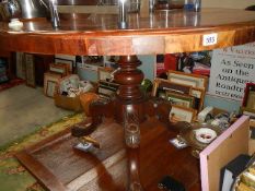 A Victorian mahogany circular table, (missing brass screws).