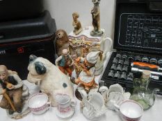 A mixed lot including figures, animals etc.