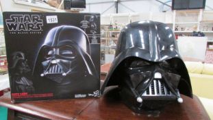 A boxed Star Wars Darth Vader electronic helmet from the Black Series,