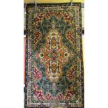 A Woodward Grovenor Axminster rug, 5'8" x 3' (1.73 x .91 cm).