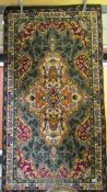 A Woodward Grovenor Axminster rug, 5'8" x 3' (1.73 x .91 cm).