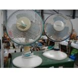 2 electric desk fans.