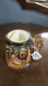 A Lord Kitchener Holiday Memorial Home commemorative tankard by Great Yarmouth Pottery,