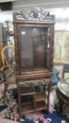 A Chinese display cabinet (missing glass panels to side and no key.