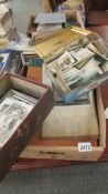 A box of assorted postcards, photographs, ephemera etc.