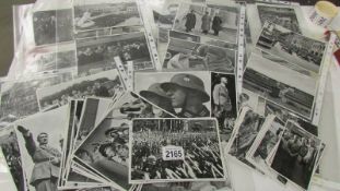 In excess of 120 WW2 German Sammelwerk No.15 Adolf Hitler postcards/photographs.