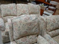 A three piece suite with recliner.