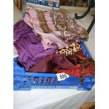 A quantity of silk scarves.