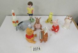 A collection of Beswick Walt Disney figures - Winnie the Pooh, Christopher Robin, Kanga, Tigger,