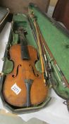 An old violin with bows in case, a/f.