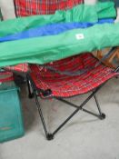 A folding camping chair and 3 others.