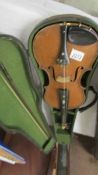 An old violin in vase, label reads J Bett, Dumfries, a/f.