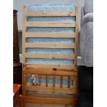 A 3ft pine bed complete with mattress.