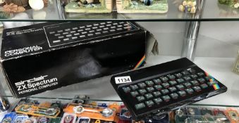 A boxed Sinclair ZX Spectrum personal computer with cables (box A/F)