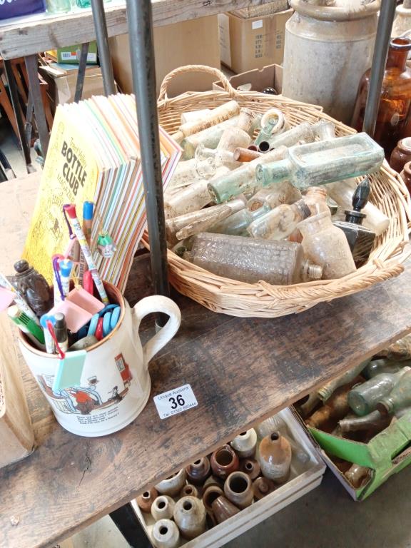 A wicker basket of potion bottles,