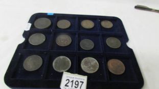 Eleven old pennies and a 1797 cartwheel 2 pence.