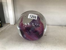 A very large heavy glass paperweight,