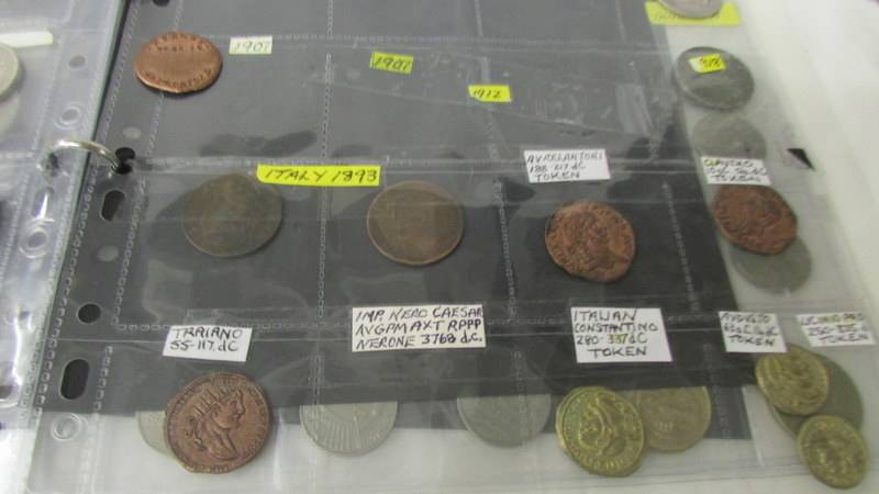 An album of in excess of 100 world coins. - Image 4 of 5