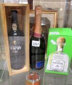 A boxed Fonseca Bin 21 Port, a bottle of Pommery champagne and a boxed bottle of Tequila.