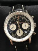 A boxed Breitling Super Constellation wrist watch with warranty certificate and original receipt of