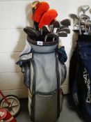A good set of 14 golf clubs with trolley, all Ping.