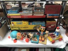 A large box of old children's games & books etc.