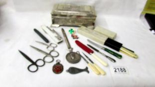 A Mixed lot including metal box with dog motif, Charles de Gaulle letter opener,