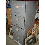 An old four drawer filing cabinet.