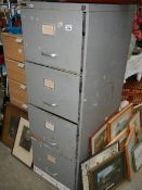 An old four drawer filing cabinet.