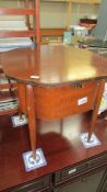 A vintage oak sewing/work table and contents, 45 x 45 x 42 cm tall.