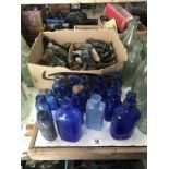 A large collection of blue glass & a box of various small potion bottles