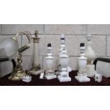 A quantity of alabaster and other table lamps.