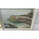 An oil on board painting of Lamorna Cove, Cornwall and dated J C Wootton, autumn 1968.