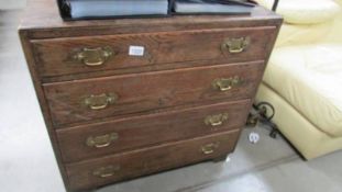 A circa 1950's 'Heathland' oak chest of drawers with brass handles, 76 x 45 x 75 cm high.