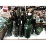 A good lot of larger green/brown bottles/jars