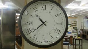 A circular wall clock.