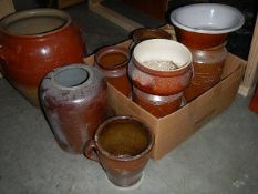 A quantity of ceramic pots.