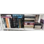 A good lot of hardback books including signed copies by Ian Rankin, Judith Durham,