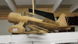 A part built model aircraft in wood (Westland Lysander).