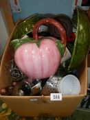 A box of assorted kitchen ware.