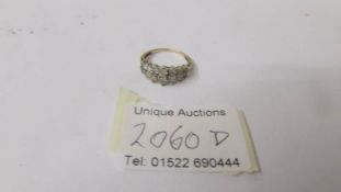 A 9ct gold and diamond ring, size O.