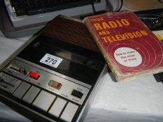 A Microfon tape recorder and a book on radio and television.