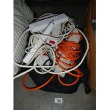 A quantity of used extension leads.