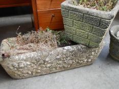 A rectangular planter and a square planter.