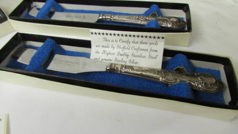 4 boxed silver handled utensils including cheese knife, butter knife and 2 pickle forks. - Image 5 of 5